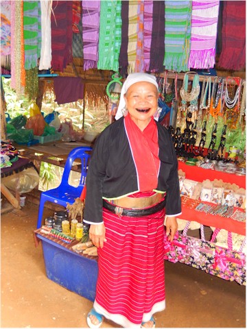 SE Asia Tour 2014 And this old lady proudly shows off the results of chewing betel nut for years - red teeth and happiness!