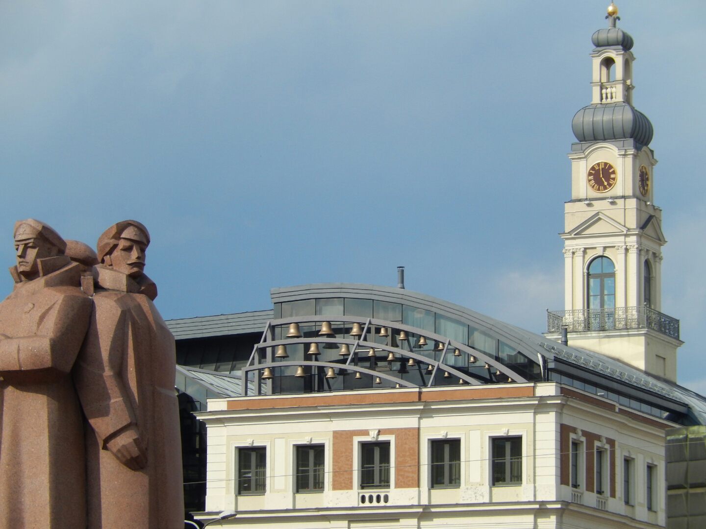 Riga, Latvia 2015 The bells in the forground were originally cast in the 13th century, but were remounted on the roof of the Riga Town Hall building in the late 20th century. The modern carillon forms a striking contrast to the Town Hall