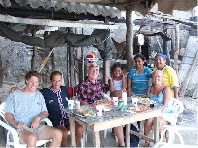 ABC Islands to Colombia 2006 ... we enjoy lunch with Reinaldo at a local family restaurant while waiting for the wind to abate.