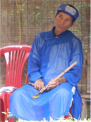 SE Asia Tour 2014
We caught the end of a water puppet demonstration, and this was one of the musicians.
