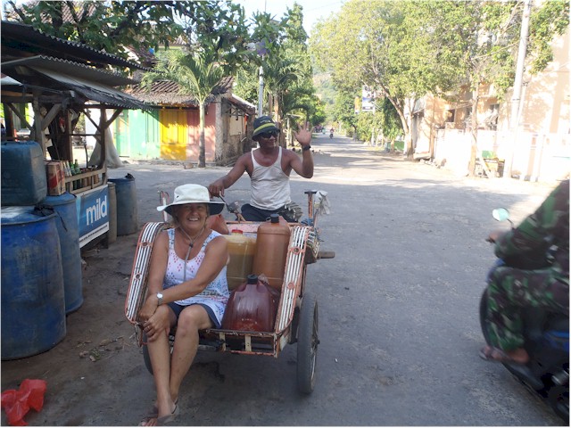 Indonesia Part 2 through to Malaysia 2013 ... and transporting the jerry cans back to the dock by local trishaw!