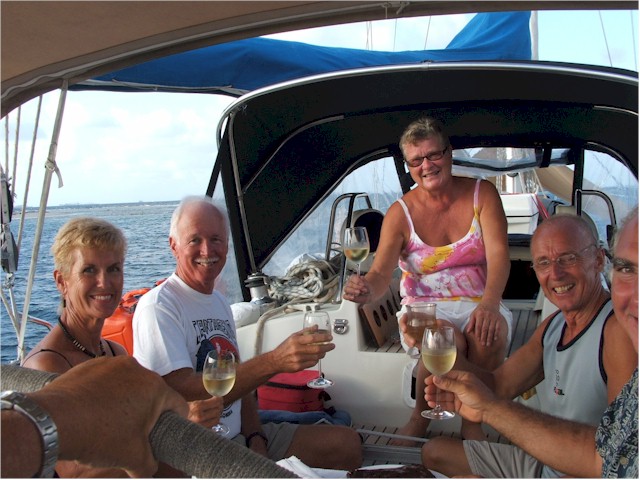 Panama 2006 Nancy and Don off Texas Reb on board Checkmate with Nils and Marit celebrating a new grand child.