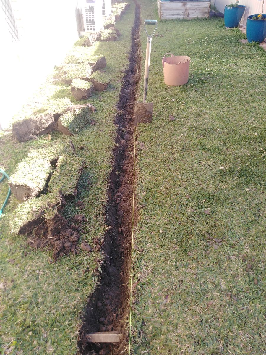 Keith dug a drainage trench down the length of the house