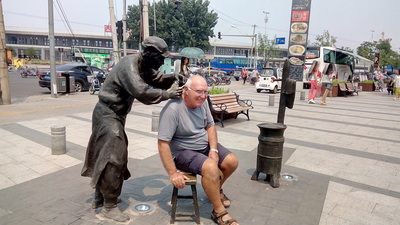 The sculptures were fabulous - the locals were amused when Keith took his position with the barber!