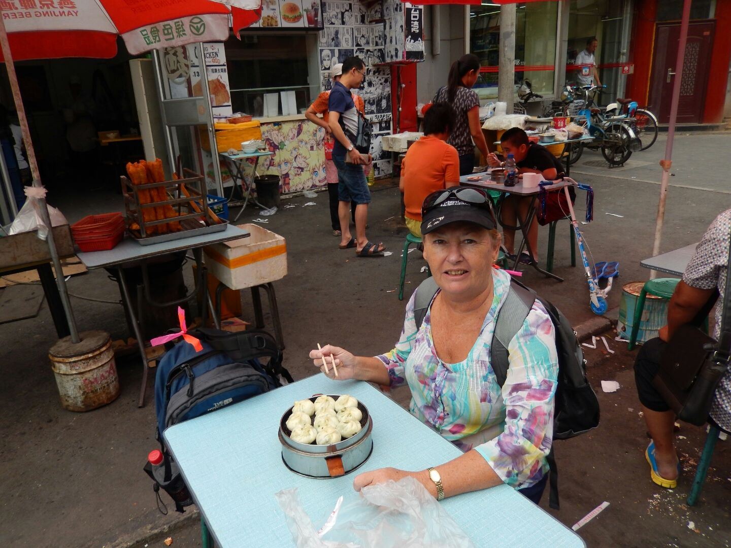 We have dumplings for breakfast at a street stall near our hotel.