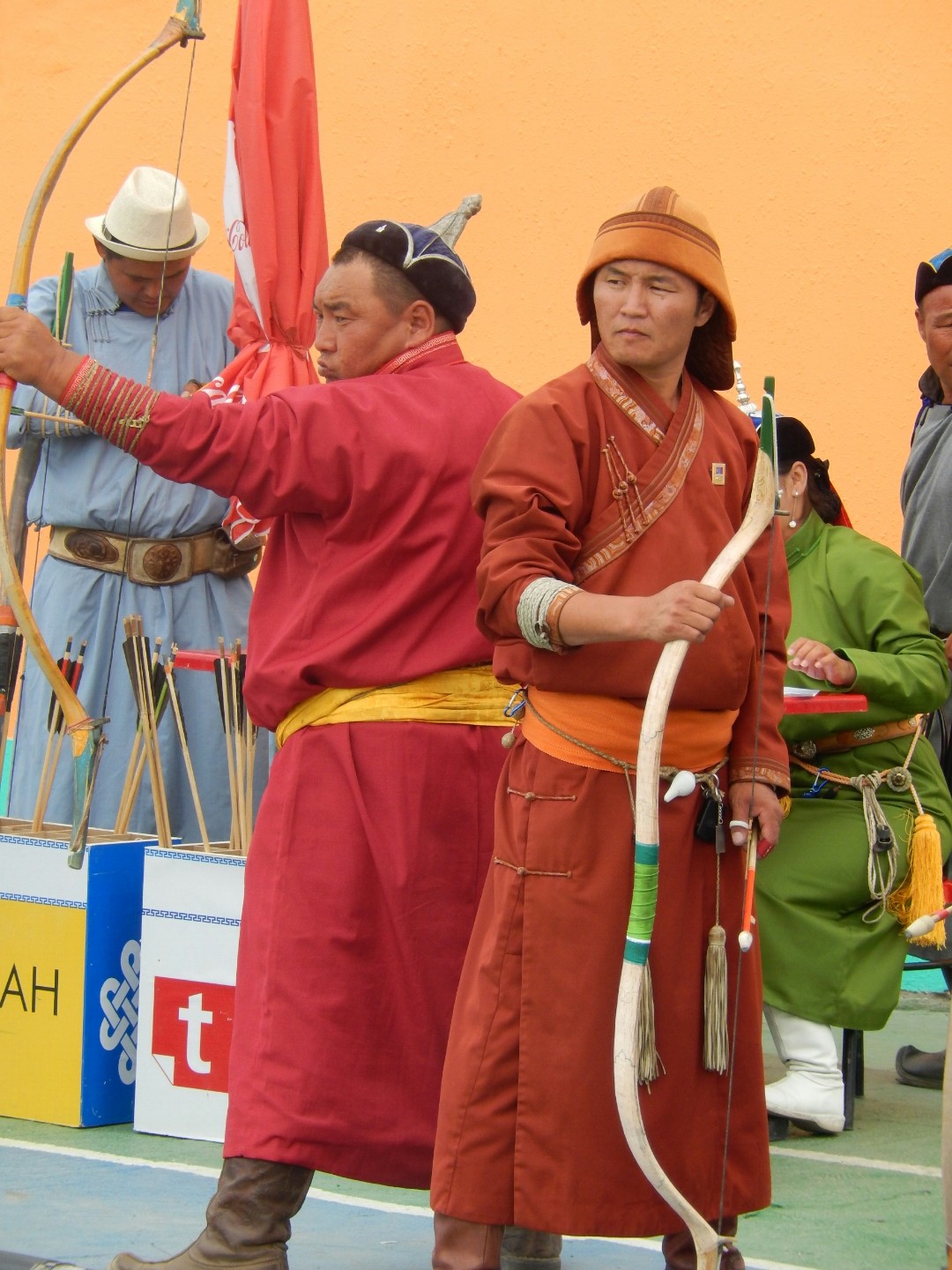 The competitors wear their traditional costume...
