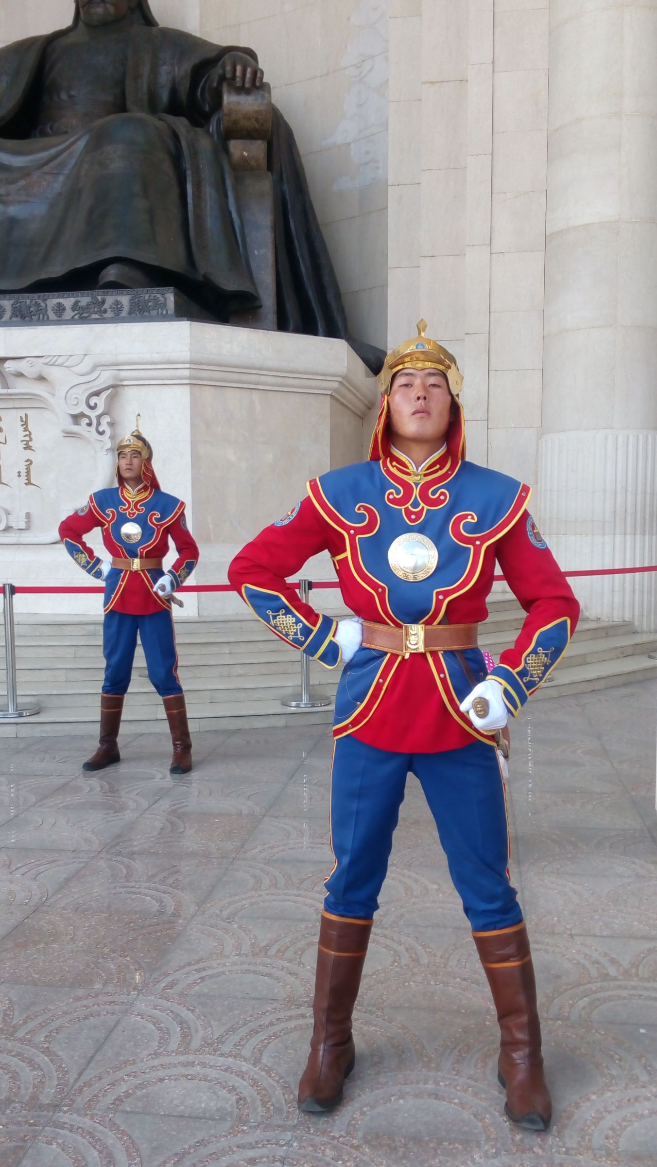 With ceremonial guards in their colourful uniforms.