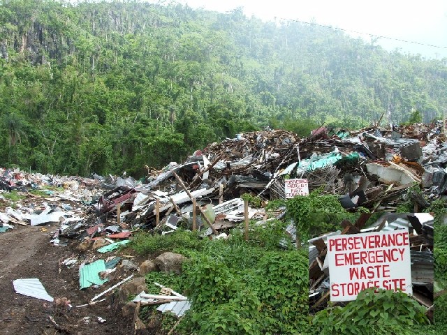 This mountain of corrugated iron fills the sports stadium - the island has no means of disposing of the ruins after the hurricane.

