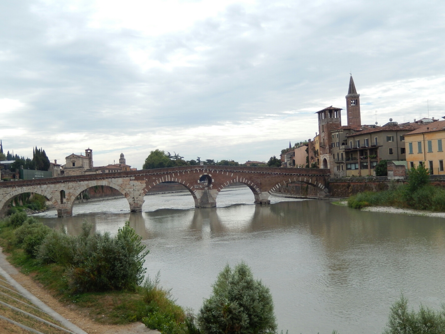 The Ponte Pietra completed in 100BC. Four arches of the bridge were blown up by retreating German troops in World War II, but rebuilt in 1957 with original materials.

