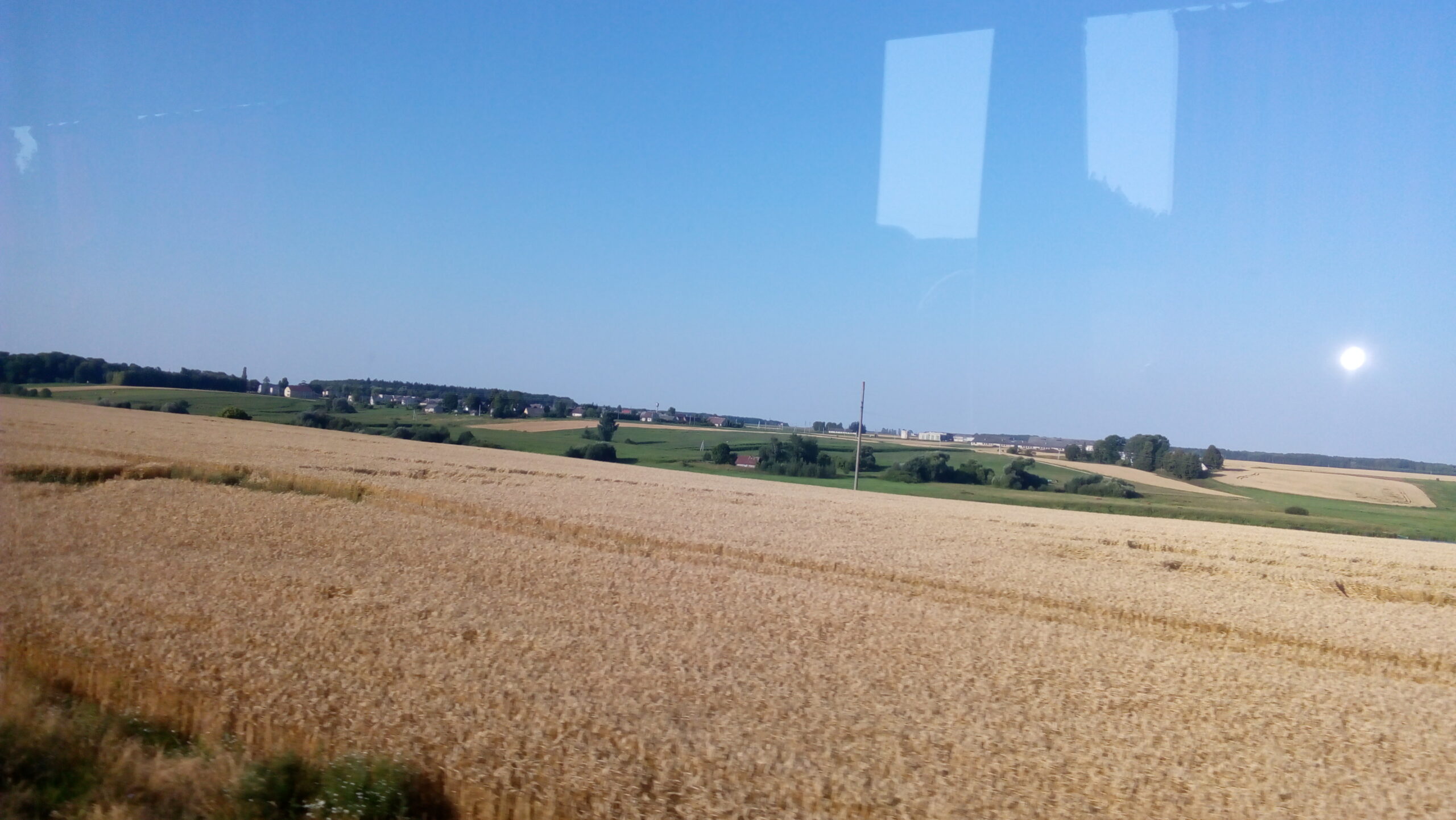 Through fertile countryside.
