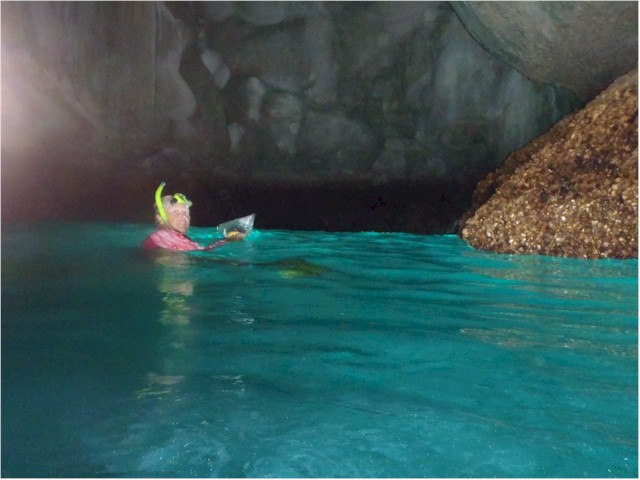 You have to swim through a dark tunnel to emerge into a land-locked beach...