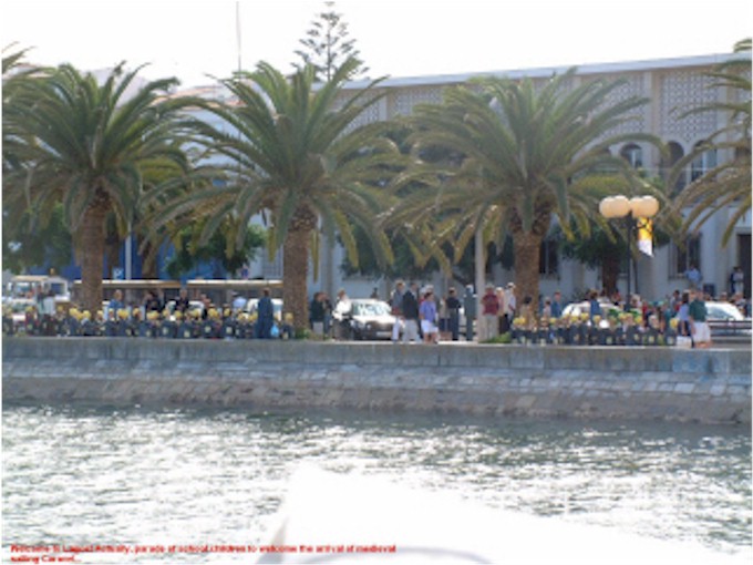 Crowds line the river to welcome us to Lagos - well, actually, to welcome the replica caravel following us in!
