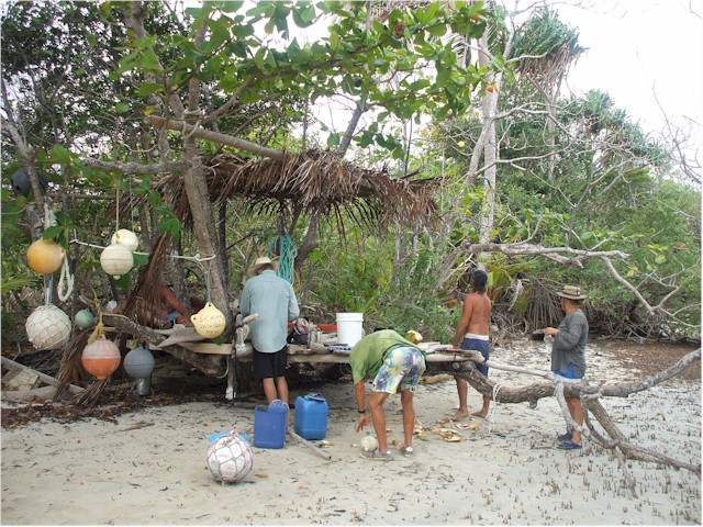 ... and the cruisers have left their calling cards using flotsam collected from the beach.