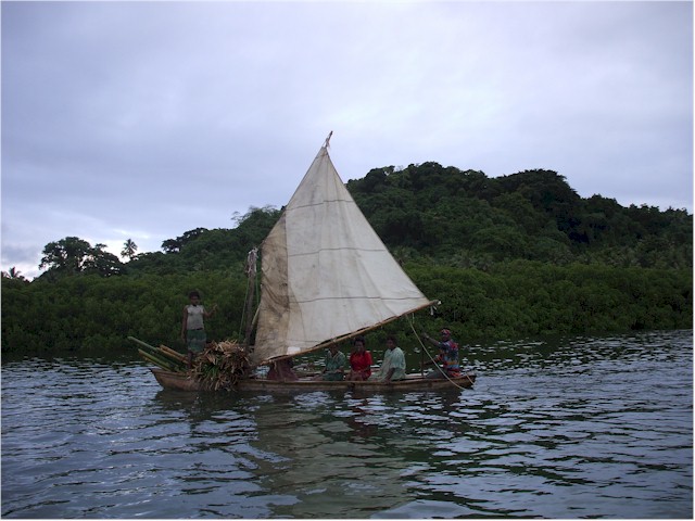 A lucky family with a sailing canoe!
