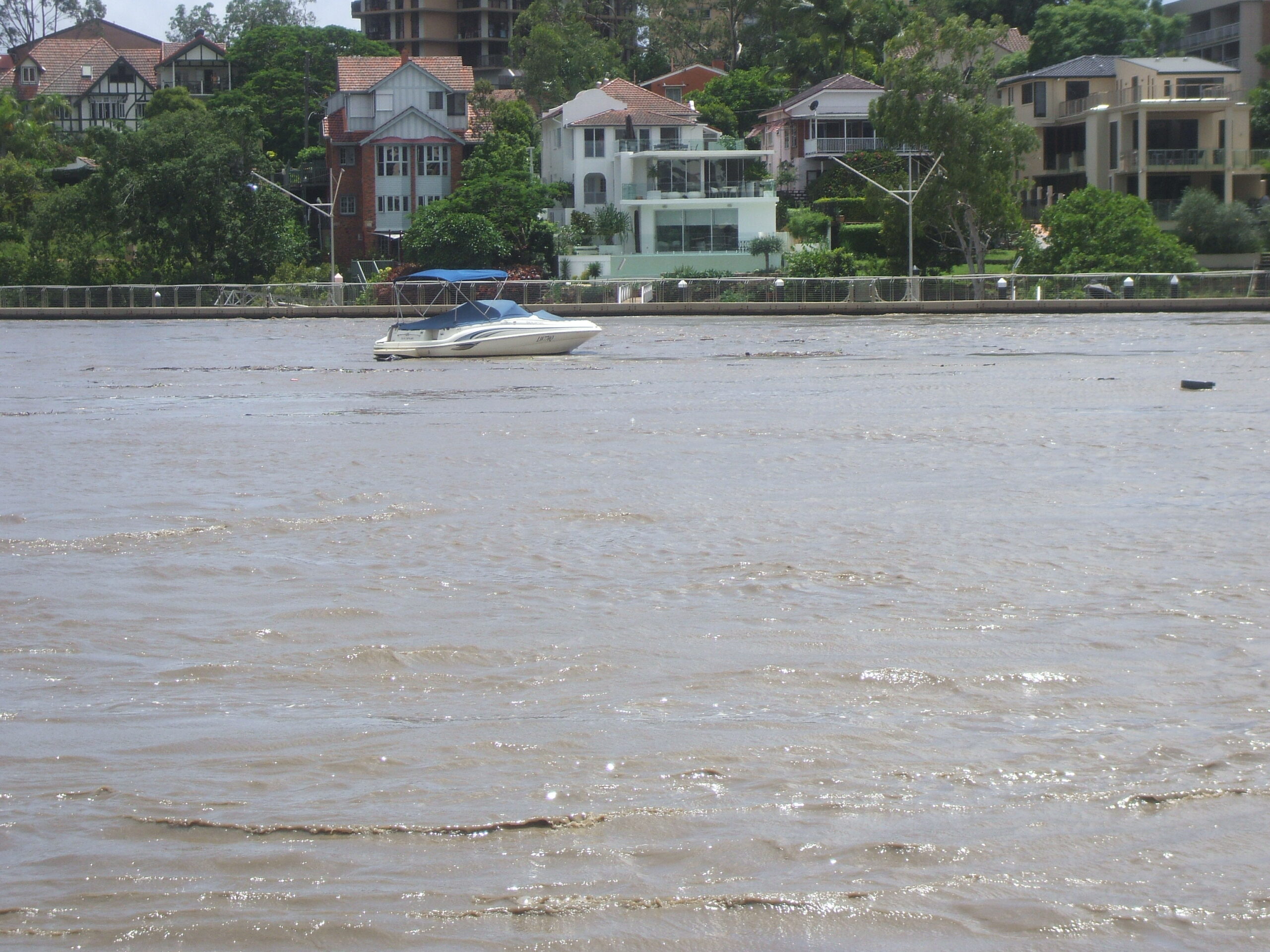 A boat adrift adds to the hazards on the river.
