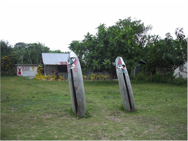 Colourful tam tam drums outside the local church.
