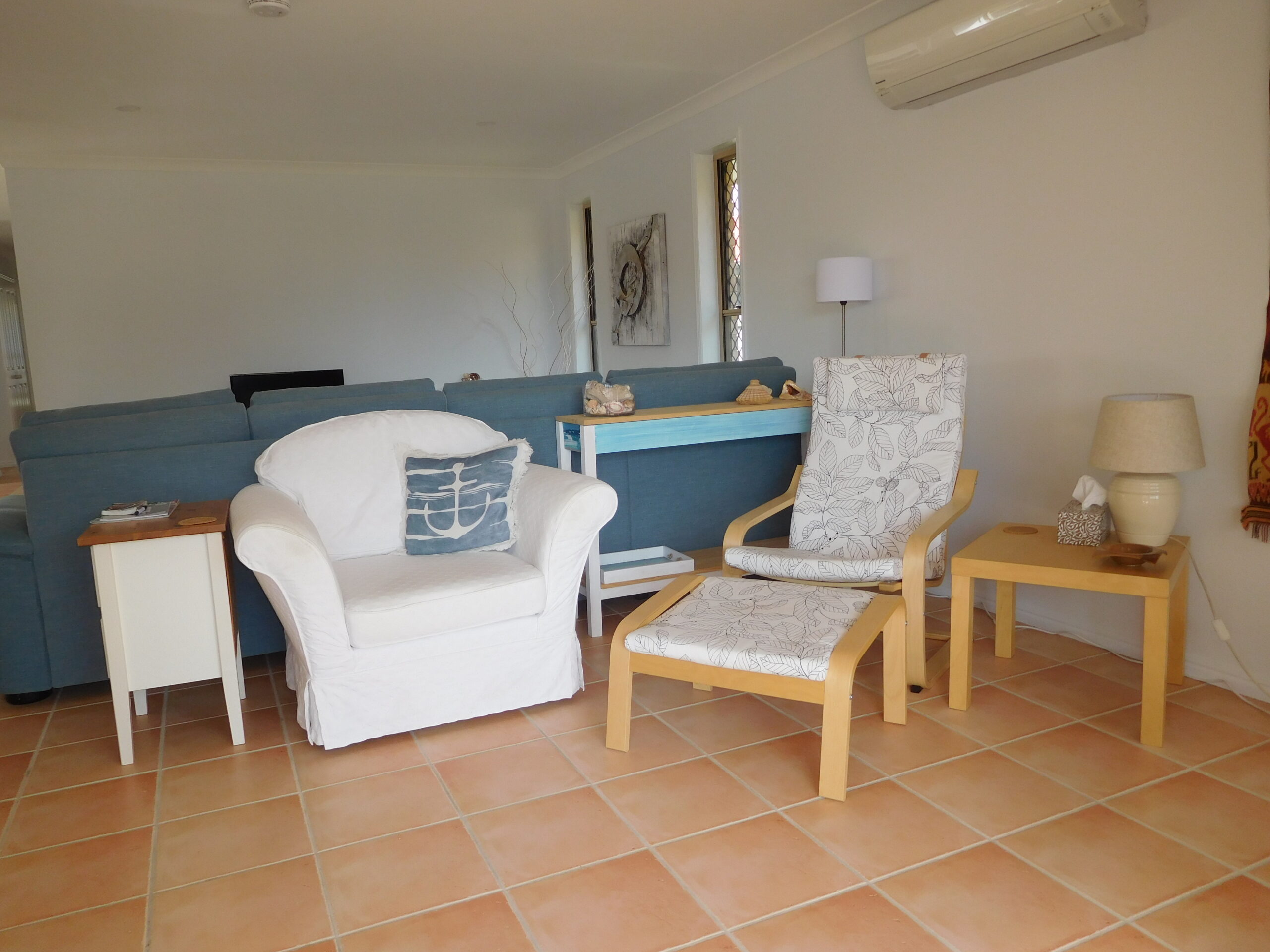 ... the other end set up as a sun lounge, looking out over the pool...