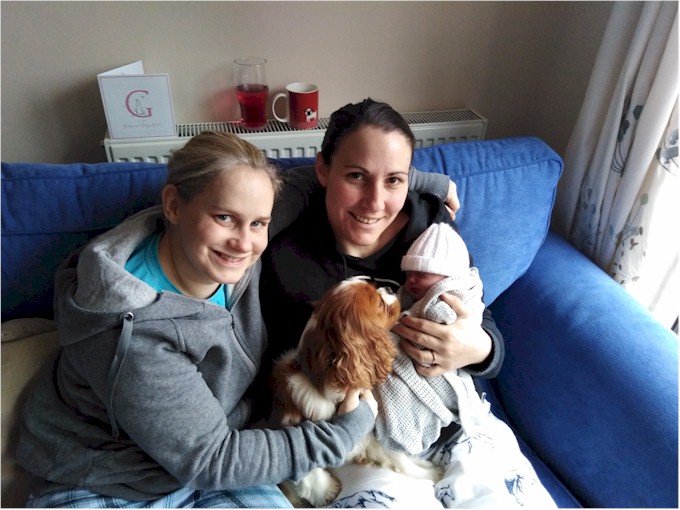 Rachel and Char with Alba and the dog Lola.