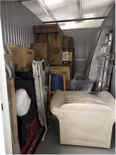 Our household goods all packed up in the storage unit while the house is being sold!