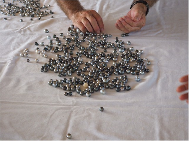 Selecting the pearls.
