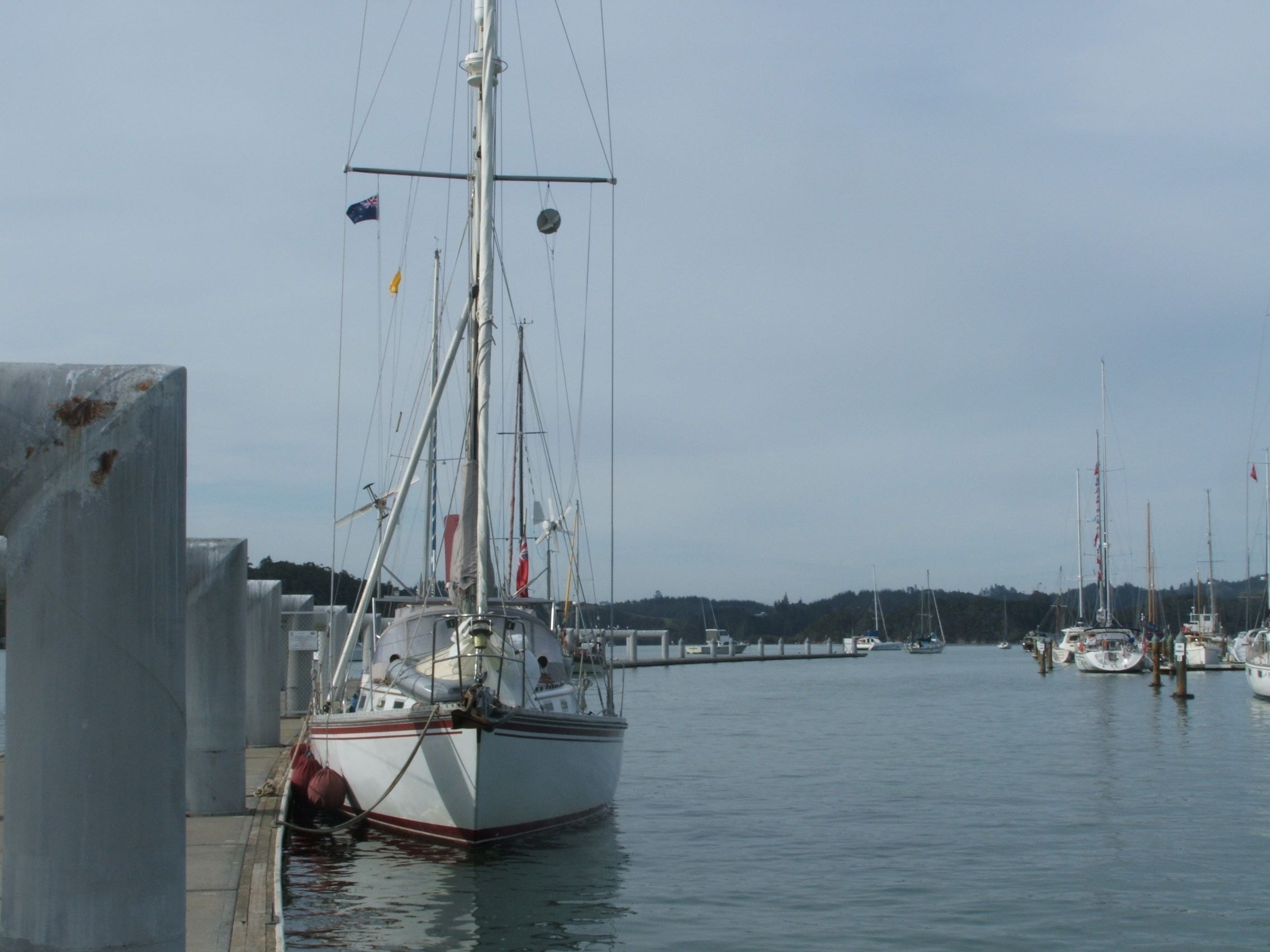 Poco Andante tied up to the Quarantine dock in Opua, NZ.
