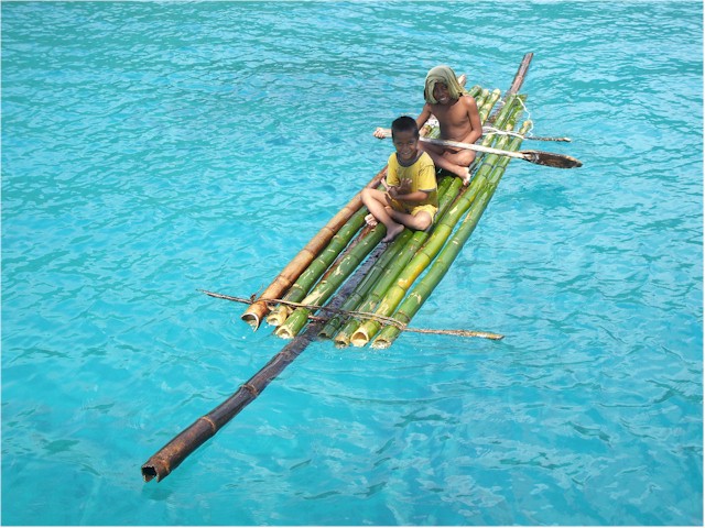 
The lads paddle out to visit us.
