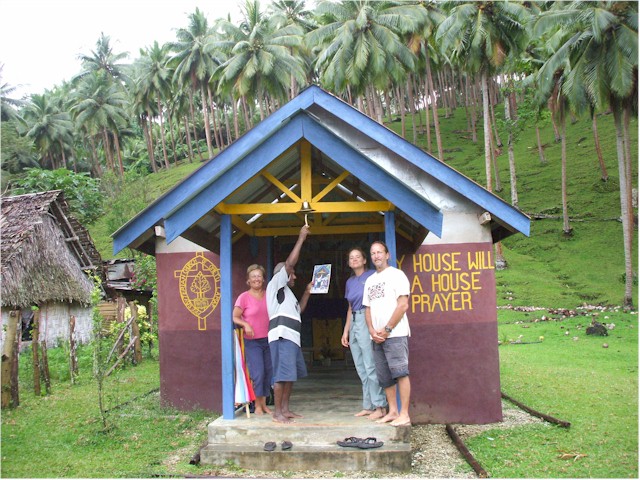 Ezekial proudly shows us the church his family built - with David & Suzanne Cheshire.
