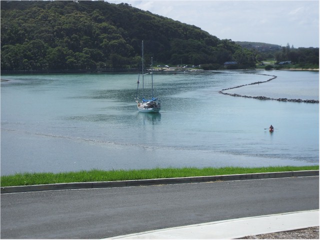 Celia Mary at anchor in Narooma - such a strong current combined with flood waters eventually caused her to drag!