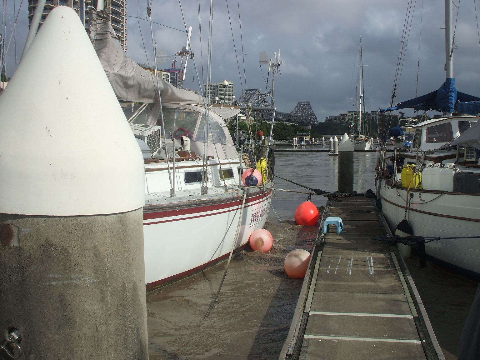 The currents are swirling and the water is rising. We nearly lost Poco Andante still tied to the dock! Very frightening.
