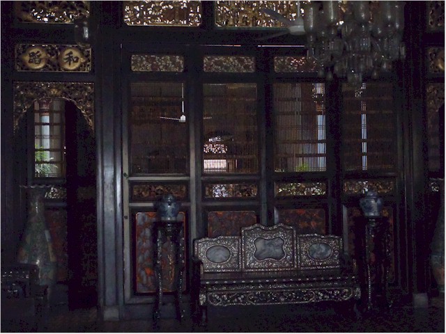 This ornately carved hardwood & inlaid mother-of-pearl screen separated women from men when guests visited.
