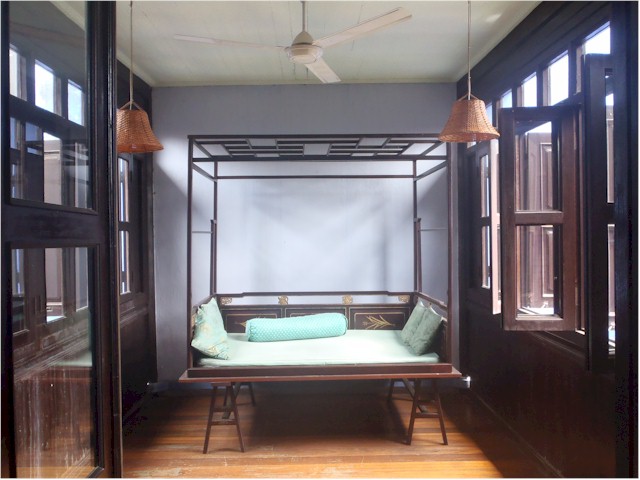 ... with a delightful day lounger situated to take advantage of the breezes.
