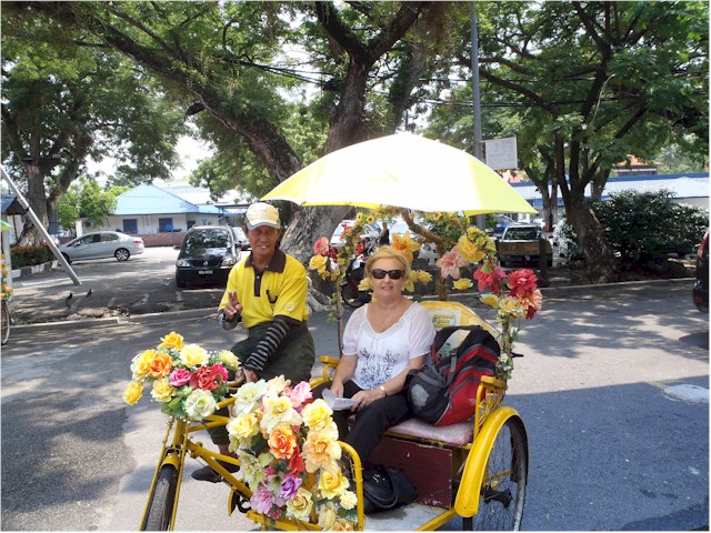 ... and we just had to take a ride on one of the pretty trishaws!
