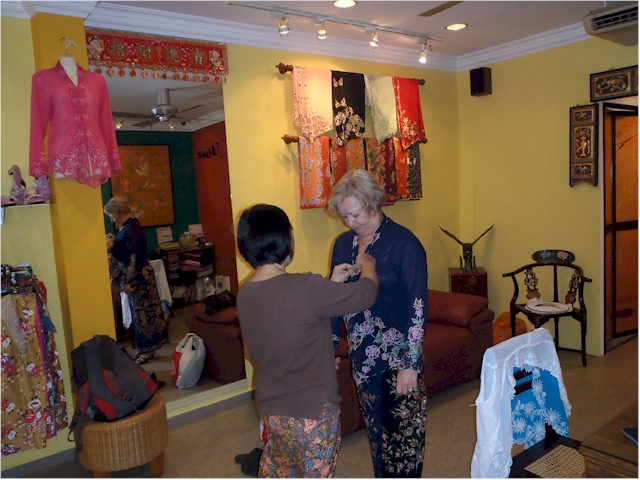 Christine gets fitted for a Kebaya (jacket) and sarong.
