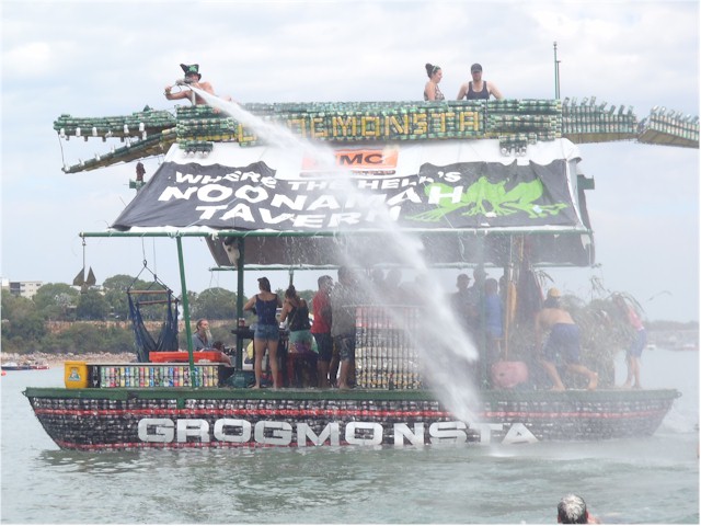 Notice the beer can crocodile along the roof of this float!
