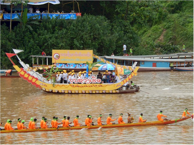 While we were at Luang Prabang, the annual boat race was on - a huge event during the wet season (hence the muddy river).
