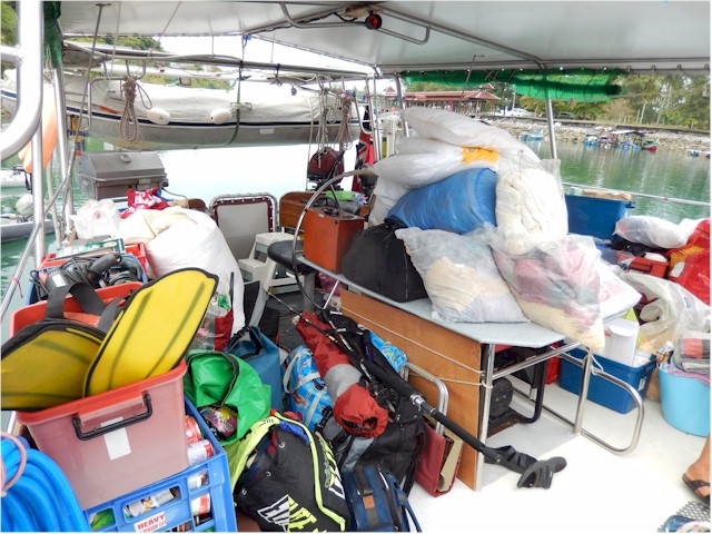 ... they kindly let us load our 12 years of accumulated 'stuff' onto their boat at Rebak Marina!
