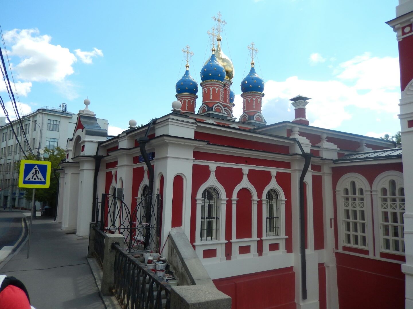 The domes of the St George Church visible in the background.
