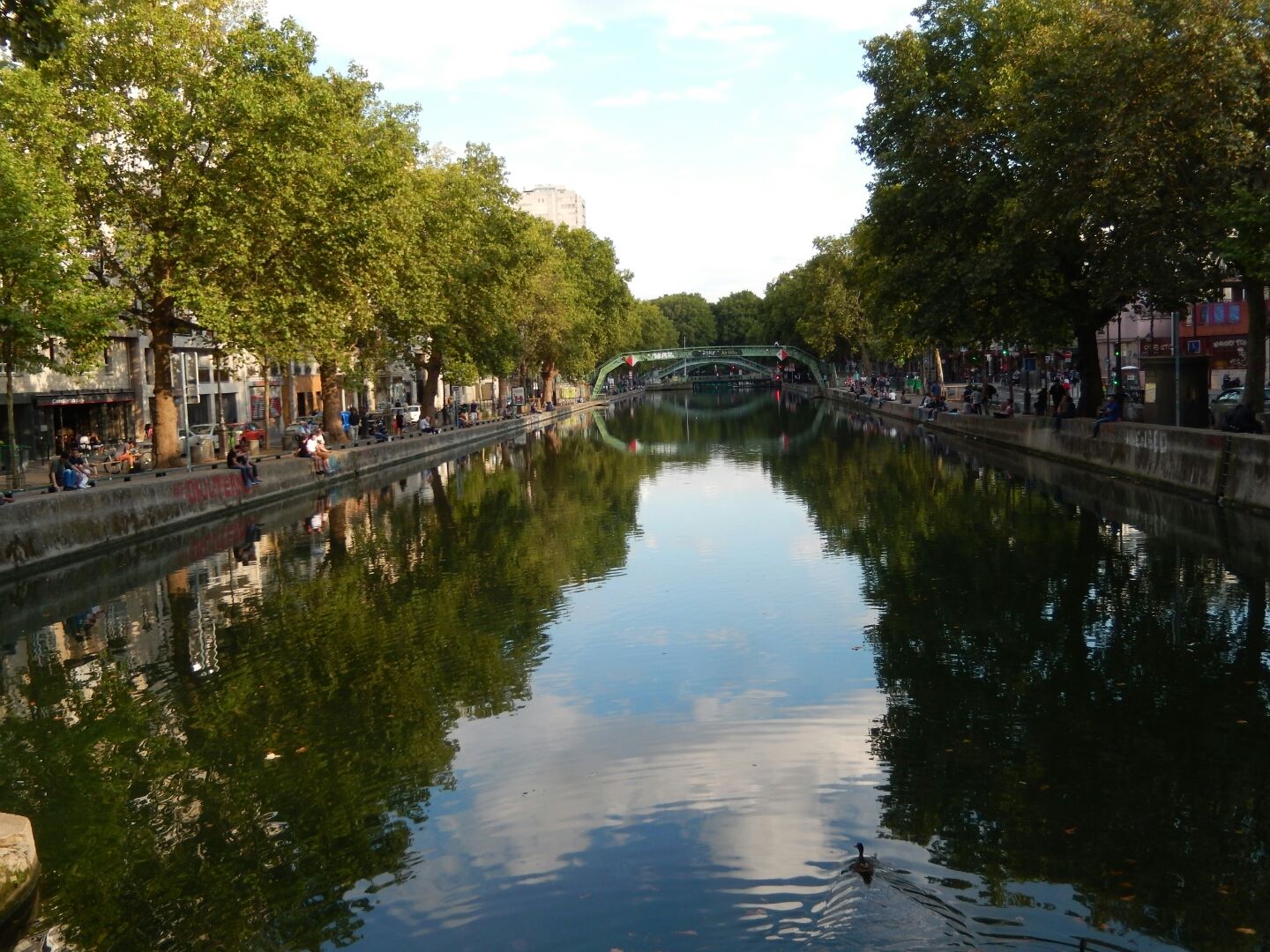 alongside the Quai de Valmy canal sitting sublimely in the sun.
